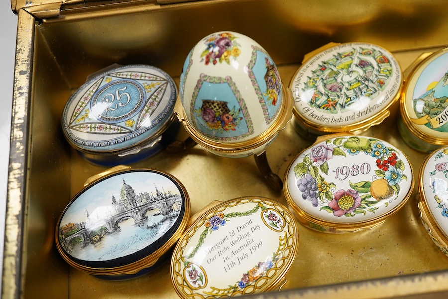 Eight Halcyon days enamel year boxes and an enamel egg shaped box on stand (9)